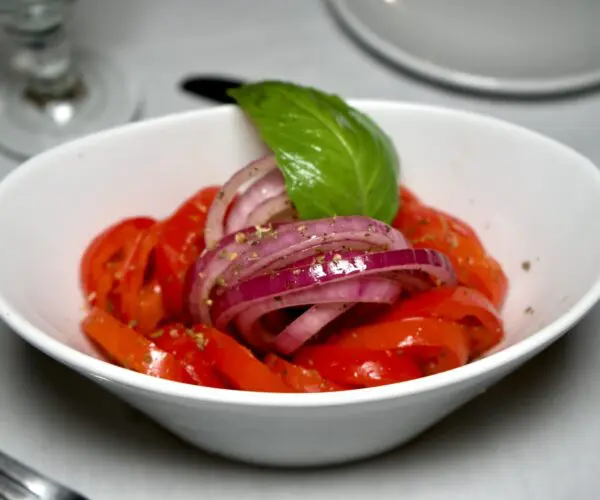 Sliced red tomato, sliced red onions, vinegar, oregano & e.v.o. oil. 13